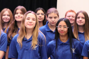 middle school students choir waiting to perform