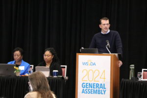 Derek Sarley speaking  at the WSSDA 2024 General Assembly